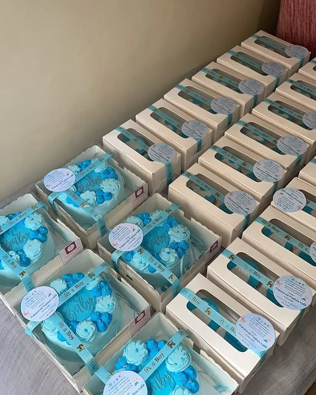 Gender reveal cake collection with multiple 'It's a Boy' and 'It's a Girl' designs for baby announcement party - Gender Celebration Cakes Karachi By Whisk And Sift